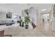 Spacious foyer showcasing the staircase, living area, and decorative tile flooring at 14231 Sonco Ave, Windermere, FL 34786