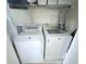 Practical laundry room with modern washer and dryer, maximizing space efficiency at 14231 Sonco Ave, Windermere, FL 34786