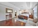 Inviting main bedroom with tray ceiling, hardwood floors, and elegant furnishings at 14231 Sonco Ave, Windermere, FL 34786