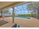 Beautiful screened-in pool and jacuzzi provide a private outdoor oasis with serene views of the surrounding landscape at 14231 Sonco Ave, Windermere, FL 34786