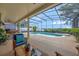 Spectacular screened-in pool and jacuzzi with extensive patio space, perfect for outdoor enjoyment and entertaining at 14231 Sonco Ave, Windermere, FL 34786