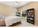 Cozy bedroom features neutral paint and carpeted floors at 1428 Lucky Pennie Way, Apopka, FL 32712