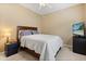 This bedroom features a ceiling fan and carpeted floors at 1428 Lucky Pennie Way, Apopka, FL 32712