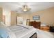 Main bedroom features a ceiling fan and plenty of space at 1428 Lucky Pennie Way, Apopka, FL 32712