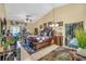 Spacious main bedroom featuring a unique decor, a ceiling fan, and natural lighting at 14650 Laguna Beach Cir, Orlando, FL 32824