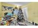 Home office with desk, whiteboard, and festive decor creates an inspiring workspace at 14650 Laguna Beach Cir, Orlando, FL 32824