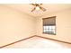 This bedroom features a ceiling fan and a window with blinds at 1575 N Ridge Lake Cir, Longwood, FL 32750