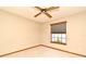 This bedroom features a ceiling fan and a window with blinds at 1575 N Ridge Lake Cir, Longwood, FL 32750