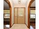 Welcoming entryway with marble floors and a beautiful view of the interior at 1575 N Ridge Lake Cir, Longwood, FL 32750