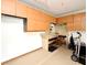 Well-organized garage space with built-in cabinets, workbench area, and ample storage at 1575 N Ridge Lake Cir, Longwood, FL 32750