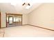 Spacious living room with a sliding glass door that leads to the patio at 1575 N Ridge Lake Cir, Longwood, FL 32750