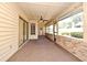 The outdoor patio is spacious and airy, with a ceiling fan at 1575 N Ridge Lake Cir, Longwood, FL 32750