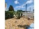 Close-up of desert landscaping with a variety of plants and rock ground cover at 16922 Se 81St Charlesfort Ave, The Villages, FL 32162