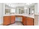 Main bathroom featuring a dual sink vanity and walk-in shower at 1778 Waterside Oaks Dr, Orange City, FL 32763