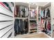 Walk-in closet featuring an array of shelving, drawers, and hanging space at 1778 Waterside Oaks Dr, Orange City, FL 32763