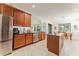 Well-appointed kitchen featuring stainless steel appliances, center island and breakfast nook at 1778 Waterside Oaks Dr, Orange City, FL 32763