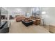 Spacious living room with neutral carpet, large windows, and ample seating at 1778 Waterside Oaks Dr, Orange City, FL 32763