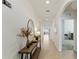 Inviting entryway featuring tiled floors, modern decor, and arched doorways at 1975 Cacutta Way, Kissimmee, FL 34744