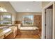 Luxurious primary bathroom features a soaking tub, walk-in shower, and dual sinks at 2019 Wintermere Pointe Dr, Winter Garden, FL 34787