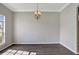 Dining room featuring hardwood floors, neutral walls, chandelier, and natural light at 2019 Wintermere Pointe Dr, Winter Garden, FL 34787