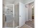 Updated bathroom with tiled shower, glass door, and modern fixtures, offering a clean and stylish space at 217 Victoria Trails Blvd, Deland, FL 32724