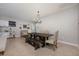 Dining room with a chandelier, a large table, and stylish seating at 217 Victoria Trails Blvd, Deland, FL 32724