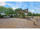 Community playground featuring climbing wall and shaded play area, perfect for Gathering fun at 217 Victoria Trails Blvd, Deland, FL 32724