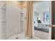 Bright ensuite bathroom with a modern shower at 2897 Elio Hammock Dr, St Cloud, FL 34773