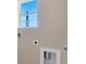 Laundry room features hook ups for a washer and dryer with a small window nearby at 2897 Elio Hammock Dr, St Cloud, FL 34773