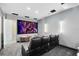 Comfortable home theater with a large screen and cozy seating perfect for movie nights at 300 Muirfield Loop, Reunion, FL 34747
