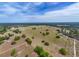 Aerial shot of land featuring spacious fields, lush trees, and natural surroundings at 35651 Huff Rd, Eustis, FL 32736