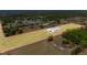 Aerial view of a vast parcel with modern buildings, showcasing the property's expansive land and potential at 35651 Huff Rd, Eustis, FL 32736