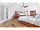 Bedroom boasts wood-look flooring and a large dresser at 35651 Huff Rd, Eustis, FL 32736