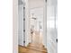 Hallway view into bedroom with ceiling fan and natural light at 35651 Huff Rd, Eustis, FL 32736