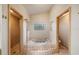 Bathroom with a bathtub, shower, and tile flooring at 4265 Conway Place Cir, Orlando, FL 32812