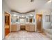 Bathroom featuring double sinks, granite countertops, glass block window, and walk-in shower at 4265 Conway Place Cir, Orlando, FL 32812