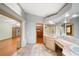 Bathroom with vanity, sink and mirror with views to other rooms at 4265 Conway Place Cir, Orlando, FL 32812