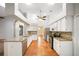 Bright kitchen with stainless steel appliances, granite counters, and a breakfast bar at 4265 Conway Place Cir, Orlando, FL 32812