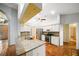 Spacious kitchen with granite countertops, white cabinets, and stainless steel appliances at 4265 Conway Place Cir, Orlando, FL 32812