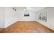 Large living room featuring tile flooring, neutral walls, and a ceiling fan at 4265 Conway Place Cir, Orlando, FL 32812