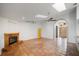 Bright living room with tile flooring, fireplace, arched doorway, and high ceilings at 4265 Conway Place Cir, Orlando, FL 32812