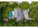 Aerial view of the home showcasing the backyard pool and mature landscaping at 502 Oak Ln, Maitland, FL 32751