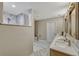 The bathroom features a marble-tiled floor and shower, along with a white vanity and sinks at 502 Oak Ln, Maitland, FL 32751