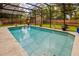 Beautiful backyard pool with clear blue water, complemented by a charming pool house and a well-maintained lawn at 502 Oak Ln, Maitland, FL 32751