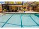 Refreshing swimming pool surrounded by a patio, featuring outdoor seating and convenient access to the home at 502 Oak Ln, Maitland, FL 32751
