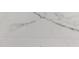 Close-up showing the details of the tile floor. Light colors with darker accents at 502 Oak Ln, Maitland, FL 32751
