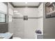 Elegant bathroom features a tiled shower with built-in niche and seating bench at 546 Via Fontana Dr # 203, Altamonte Springs, FL 32714