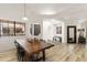Open dining room with stylish floors, modern lighting and view to front entry at 546 Via Fontana Dr # 203, Altamonte Springs, FL 32714