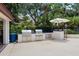 This grilling area features stainless steel appliances, an outdoor bar, and is perfect for community entertainment at 546 Via Fontana Dr # 203, Altamonte Springs, FL 32714