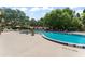 Beautiful community pool with lounge area and BBQ perfect for relaxing and entertaining guests on a sunny day at 546 Via Fontana Dr # 203, Altamonte Springs, FL 32714
